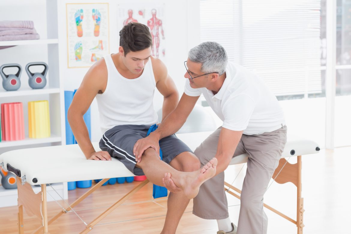 Back2Fitness physio treating an elderly patient to recover from back pain